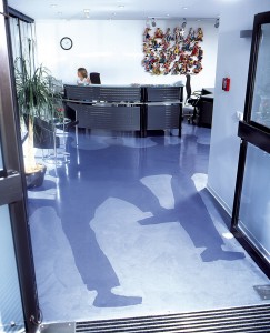 Modern colored concrete design with shadows imprinted in floor.