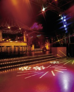 A new acrylic floor sealer brings the night life to full color under the lights of a dance floor.