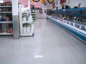 Front display area of warehouse benefits from the new acrylic flooring adhesive with a brighter display room.