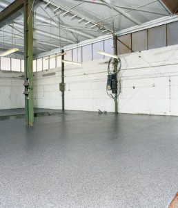 Acrylic impregnated application to warehouse floor displays beautiful grey shine.