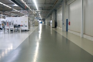 Large warehouse with new LEED flooring product displays new floor.