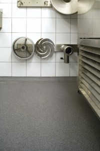 Laboratory work room proudly displays its new chemical resistant concrete flooring.