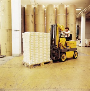 Concrete slabs endure forklift abuse with the help of a new industrial floor coating in this large warehouse.