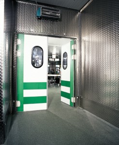 Bright white & green doors help keep the cold in for these featured walk in freezer floors.