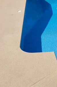 Outdoor pool decks shine with brightness with new concrete coatings.