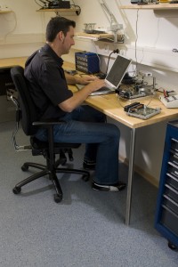 Office building flooring protects this desk area with a superb acrylic poured resin system.