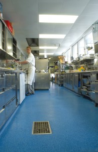 Cement coating products protect this floor while cooks begin their morning prep work.