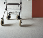 Walker on assisted living flooring.