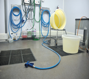 A floor system resistant to chemically damaging products protects clean room area.