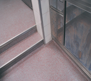 Light maroon floorings complete access steps for a commercially designed project.