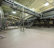 Gray floor inside food production plant.
