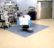 yellow hospital floor with x-ray machine coming from celling