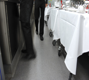 No slip agents protect flooring surface for waiters and waitresses busily working in close quarters.