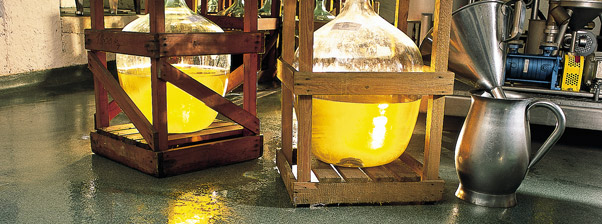 Two large crated jugs rest on newly installed commercial flooring provided by local contractor in Los Angeles California.