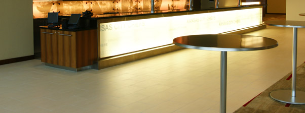 Large lighted bar highlights the commercial flooring work for a professional contractor located in Seattle Washington.