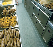 Cafeteria flooring keeps buffet clean and appealing.