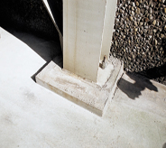 Dilapidated concreted pillar demonstrates need for new resurfacing product.