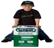 Boy stands over a container of concrete resurfacing product.
