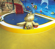 A bright yellow floor in a daycare can brighten up the space.