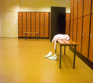 Fitness center locker room floors can come in all different colors, like this beautiful natural tone.