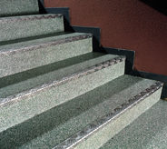 Floors in government buildings can be accented by a simple design at the edge of each stair. 