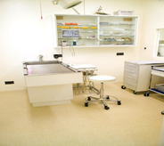 Healthcare exam room eluminates with bright tan floor sheen.