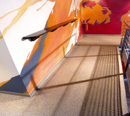 High rised building interior access ramp system allows easy access for all patrons.