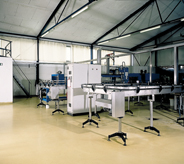 Equipment set on an empty laboratory floor.