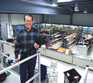 Owner proudly stands atop his newly installed enhanced mma floor system while proudly overlooking his facility.