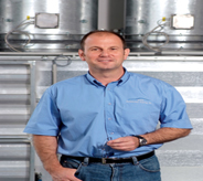 Ghost grey colored mma enhanced flooring provides backdrop for a facility engineer.