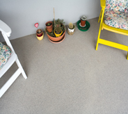 Balcony of motel room as clean grey floor.