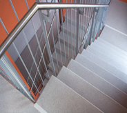 Shopping mall stairwell floor keeps shoppers from slipping.