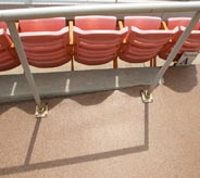 Seats are empty on this stadium floor.