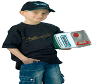 Young boy holding canister of industrialed concrete coating supplies lightly smiles with one hand in pocket.