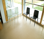 The waiting room floor looks bright and clean.